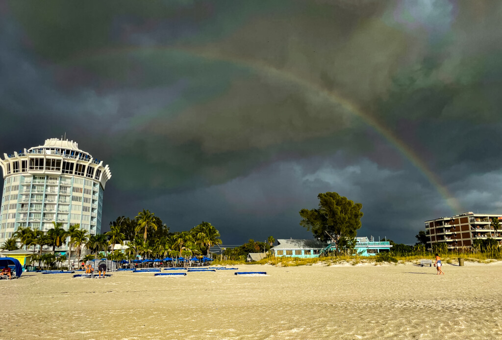 A rainbow over a beach

Description automatically generated with low confidence