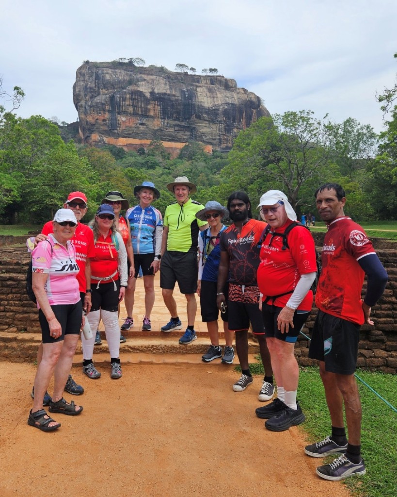 A group of people posing for a photo

Description automatically generated