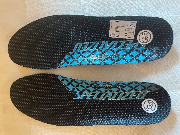 A pair of insoles on a white surface

AI-generated content may be incorrect.