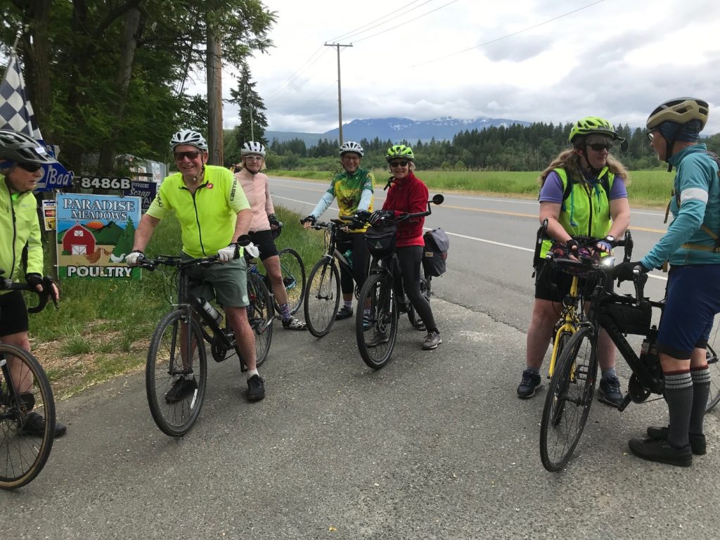 A group of people on bicycles

AI-generated content may be incorrect.
